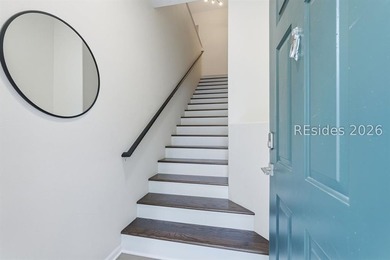 Extensively renovated in 2023, this second-floor end unit offers - photo 5