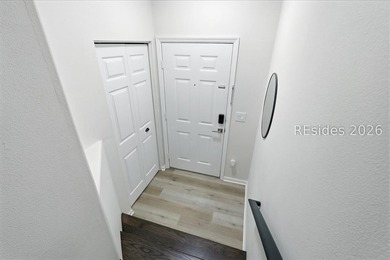 Extensively renovated in 2023, this second-floor end unit offers - photo 6