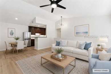 Extensively renovated in 2023, this second-floor end unit offers - photo 8