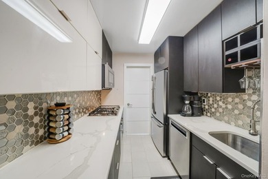 Experience elevated living in this beautiful 2 bedroom corner - photo 6