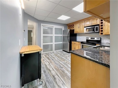 Where do we even begin with this beautifully updated 2-bedroom - photo 10