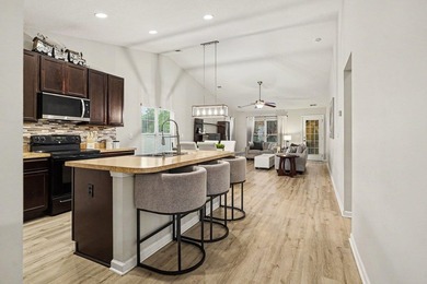This 3-bedroom, 2-bath home offers added privacy with protected - photo 5