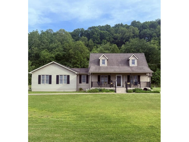 Don't miss this unique and charming Cape Cod home situated on - photo 1