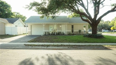 Welcome to this beautifully updat4ed 3-bedroom, 2-bathroom block - photo 1