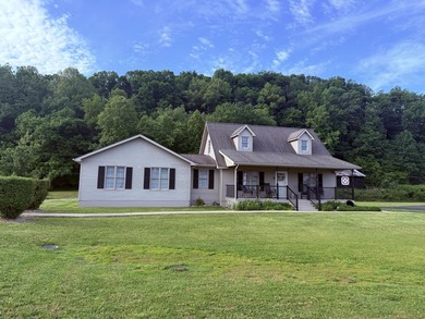 Don't miss this unique and charming Cape Cod home situated on - photo 3