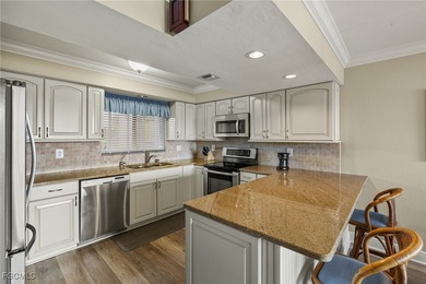 One of the lowest priced THREE BEDROOM TWO BATH condos in The - photo 4