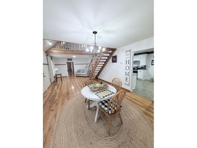 Don't miss this unique and charming Cape Cod home situated on - photo 5