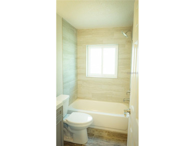 Welcome to this beautifully updat4ed 3-bedroom, 2-bathroom block - photo 8