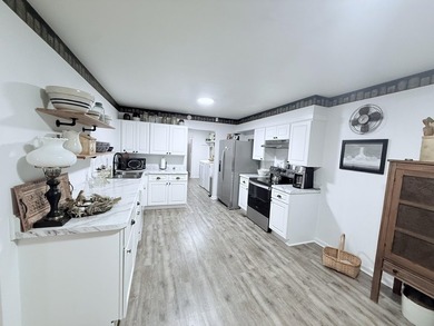 Don't miss this unique and charming Cape Cod home situated on - photo 10