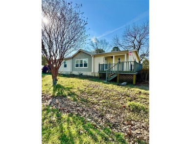 Lake life just got easy in Push Hill Cove! This 3 bed, 2 bath - photo 1