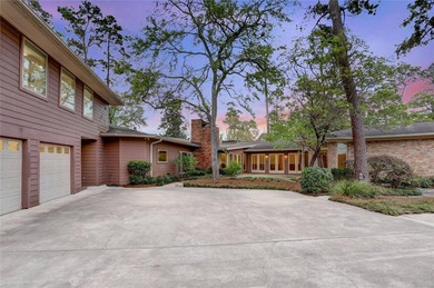 Tucked beneath towering mature trees, this sprawling ranch home - photo 12