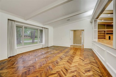 Tucked beneath towering mature trees, this sprawling ranch home - photo 14