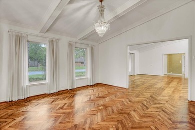 Tucked beneath towering mature trees, this sprawling ranch home - photo 15