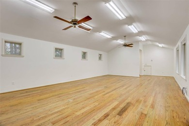 Tucked beneath towering mature trees, this sprawling ranch home - photo 18