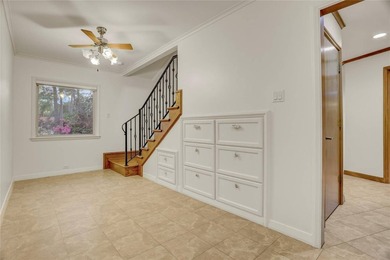 Tucked beneath towering mature trees, this sprawling ranch home - photo 19