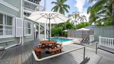 Located at 521 United Street, the Southernmost Inn was - photo 10