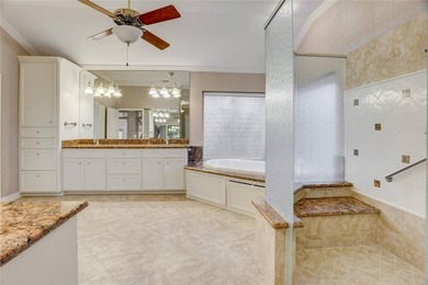 Tucked beneath towering mature trees, this sprawling ranch home - photo 26