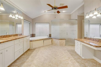 Tucked beneath towering mature trees, this sprawling ranch home - photo 27