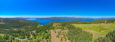 Breathtaking panoramic lake and mountain views await from this - photo 29