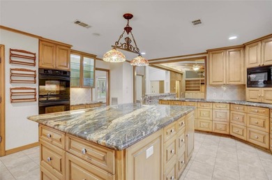 Tucked beneath towering mature trees, this sprawling ranch home - photo 38