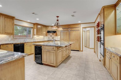 Tucked beneath towering mature trees, this sprawling ranch home - photo 40