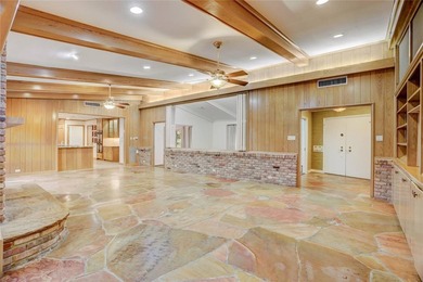 Tucked beneath towering mature trees, this sprawling ranch home - photo 41