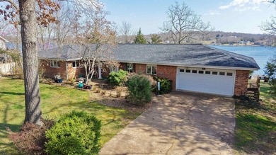 Enjoy lakeside living in this 3-bedroom, 2.5-bathroom brick home - photo 1