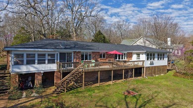 Enjoy lakeside living in this 3-bedroom, 2.5-bathroom brick home - photo 2