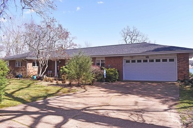 Enjoy lakeside living in this 3-bedroom, 2.5-bathroom brick home - photo 6