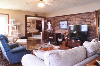 Enjoy lakeside living in this 3-bedroom, 2.5-bathroom brick home - photo 7
