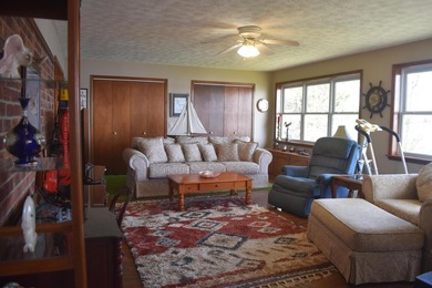 Enjoy lakeside living in this 3-bedroom, 2.5-bathroom brick home - photo 8