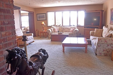 Enjoy lakeside living in this 3-bedroom, 2.5-bathroom brick home - photo 10
