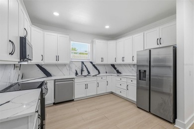Virtually Staged. Welcome to effortless Florida living in this - photo 6