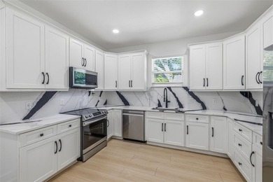 Virtually Staged. Welcome to effortless Florida living in this - photo 7