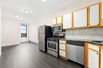 Welcome to this lovely, updated 2-bedroom, 1-bathroom condo - photo 1