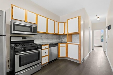 Welcome to this lovely, updated 2-bedroom, 1-bathroom condo - photo 2