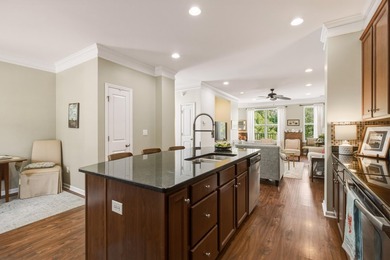 Welcome to this sophisticated and coveted end-unit townhome in - photo 12