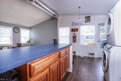 This charming 3 bedroom, 1 bath home offers an open floor plan - photo 12