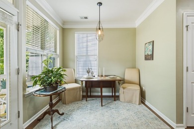 Welcome to this sophisticated and coveted end-unit townhome in - photo 13