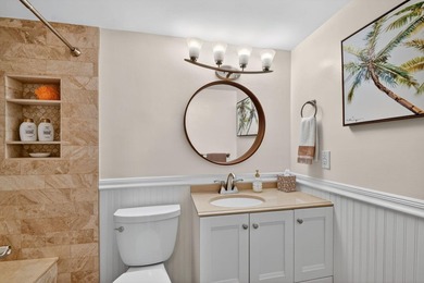 Experience sophisticated coastal living in this exquisitely - photo 25