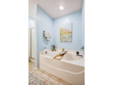 Welcome to this sophisticated and coveted end-unit townhome in - photo 31