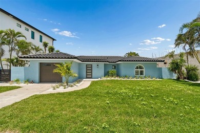 Price Improvement! Experience the pinnacle of refined waterfront - photo 1