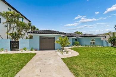 Price Improvement! Experience the pinnacle of refined waterfront - photo 2