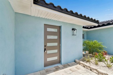 Price Improvement! Experience the pinnacle of refined waterfront - photo 3