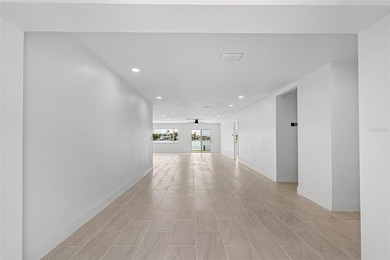 Price Improvement! Experience the pinnacle of refined waterfront - photo 4