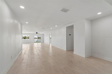 Price Improvement! Experience the pinnacle of refined waterfront - photo 5