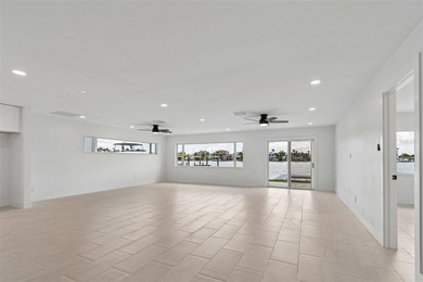 Price Improvement! Experience the pinnacle of refined waterfront - photo 7