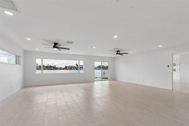 Price Improvement! Experience the pinnacle of refined waterfront - photo 8