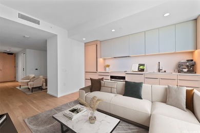 NEW PRICE! Experience effortless urban living in this spacious - photo 2