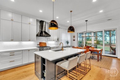 Waterfront, well-appointed, custom home built in 2022 with